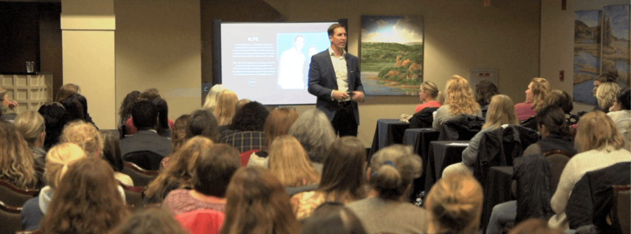 A full room at one of Dr. Steve Tullius's live presentations